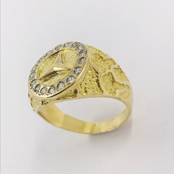 Sello con el sÃ­mbolo de Mercedes-Benz en oro 18kt