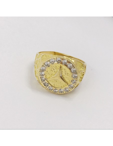 Sello con el sÃ­mbolo de Mercedes-Benz en oro 18kt