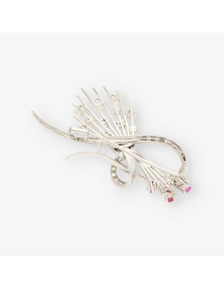 Broche oro blanco y bri