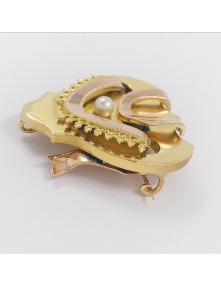 Broche de oro con perlita