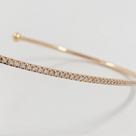 Esclava fina en oro rosa con brillantes.