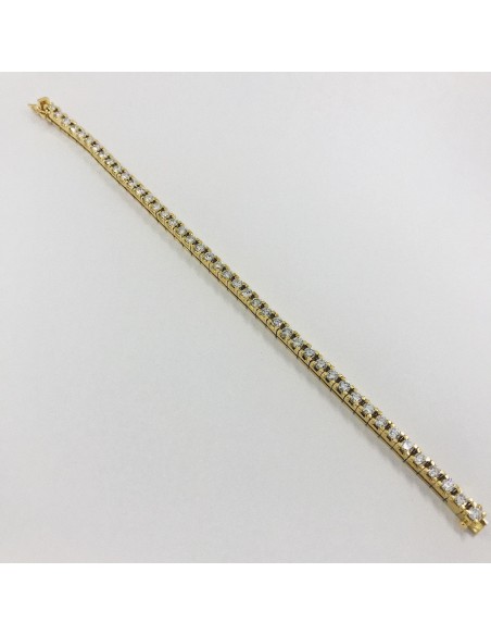 Pulsera riviÃ¨re en oro con brillantes.