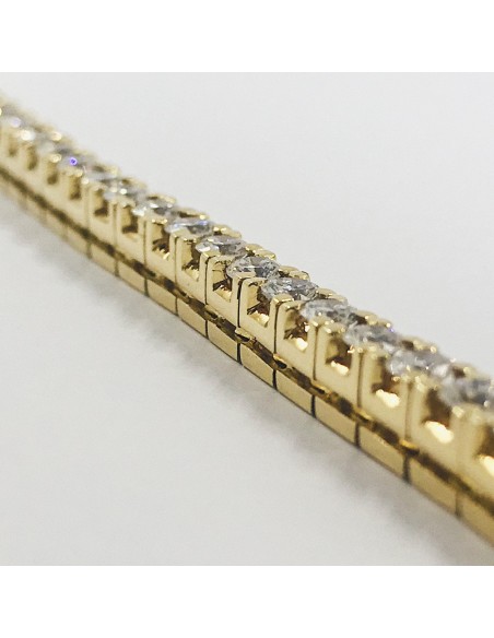 Pulsera riviÃ¨re en oro con brillantes.