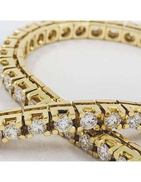 Pulsera riviÃ¨re en oro con brillantes.