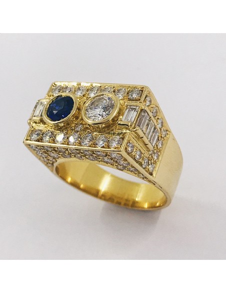 Anillo en oro 18kt con brillantes y zafiro.