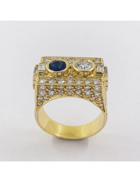Anillo en oro 18kt con brillantes y zafiro.