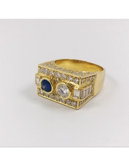 Anillo en oro 18kt con brillantes y zafiro.