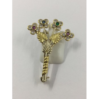 Broche de oro, circonitas y piedras de color