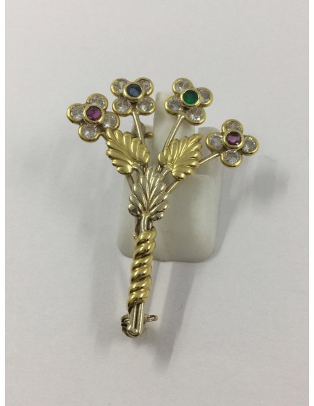 Broche de oro, circonitas y piedras de color
