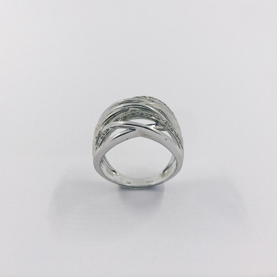 Anillo Tous en oro blanco con brillantes.