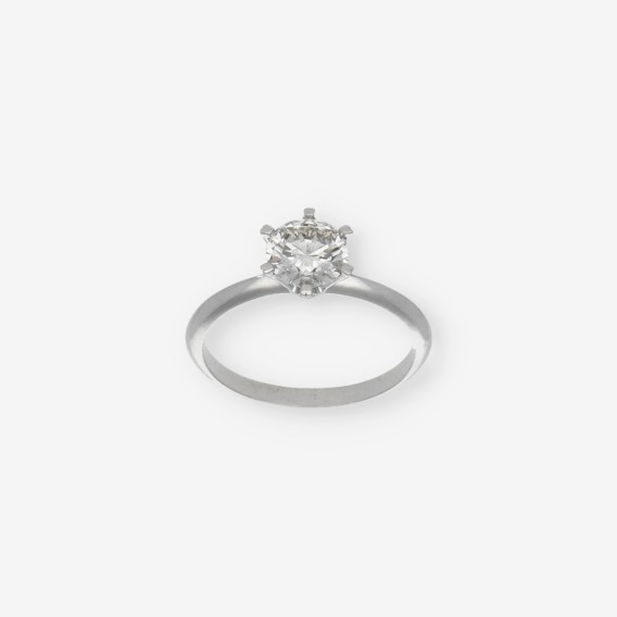 Anillo solitario en oro blanco 18kt y brillante.