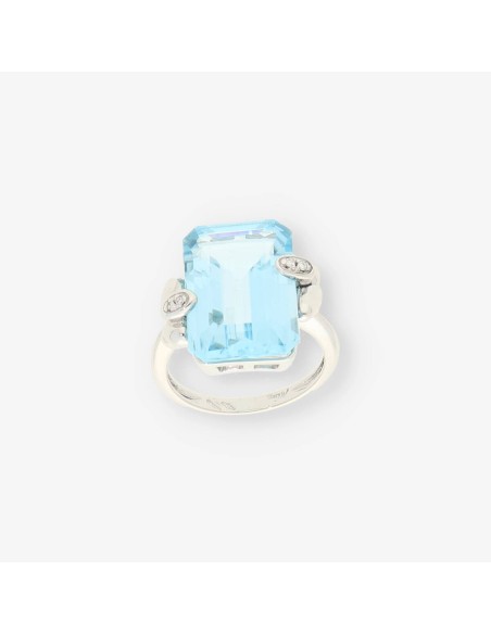 Anillo oro blanco y topacio azul