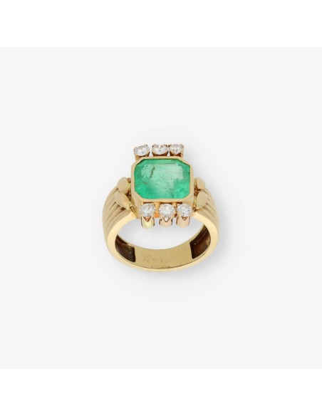 Anillo en oro 18kt con esmeralda y brillantes