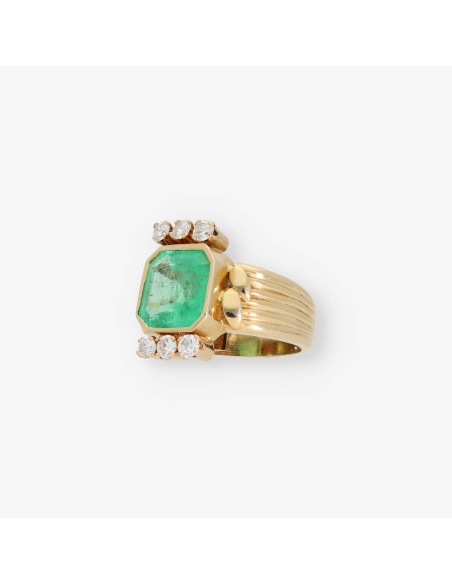 Anillo en oro 18kt con esmeralda y brillantes
