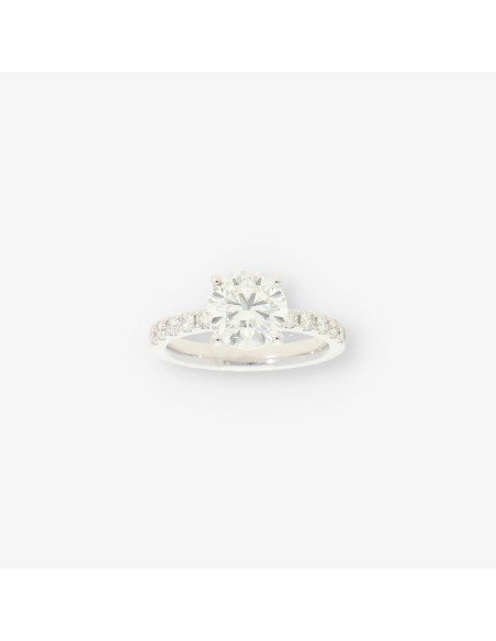 Anillo oro bl. bri central aprox 2,30 Qt