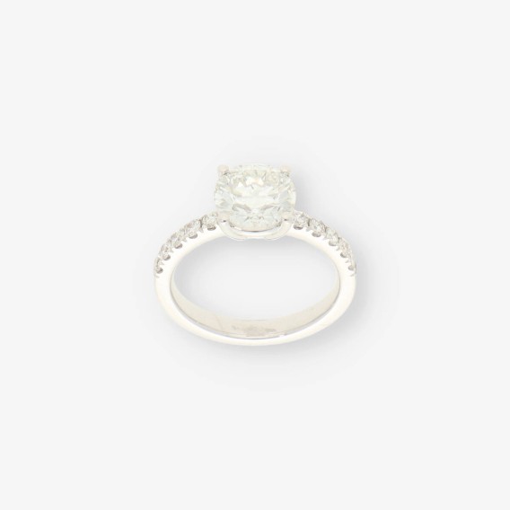 Anillo oro bl. bri central aprox 2,30 Qt