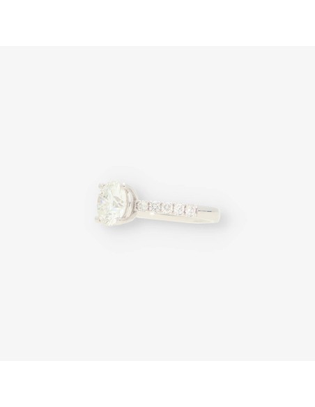 Anillo oro bl. bri central aprox 2,30 Qt