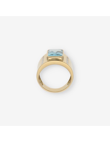 Anillo en oro 18kt con piedra azul y Brillantes